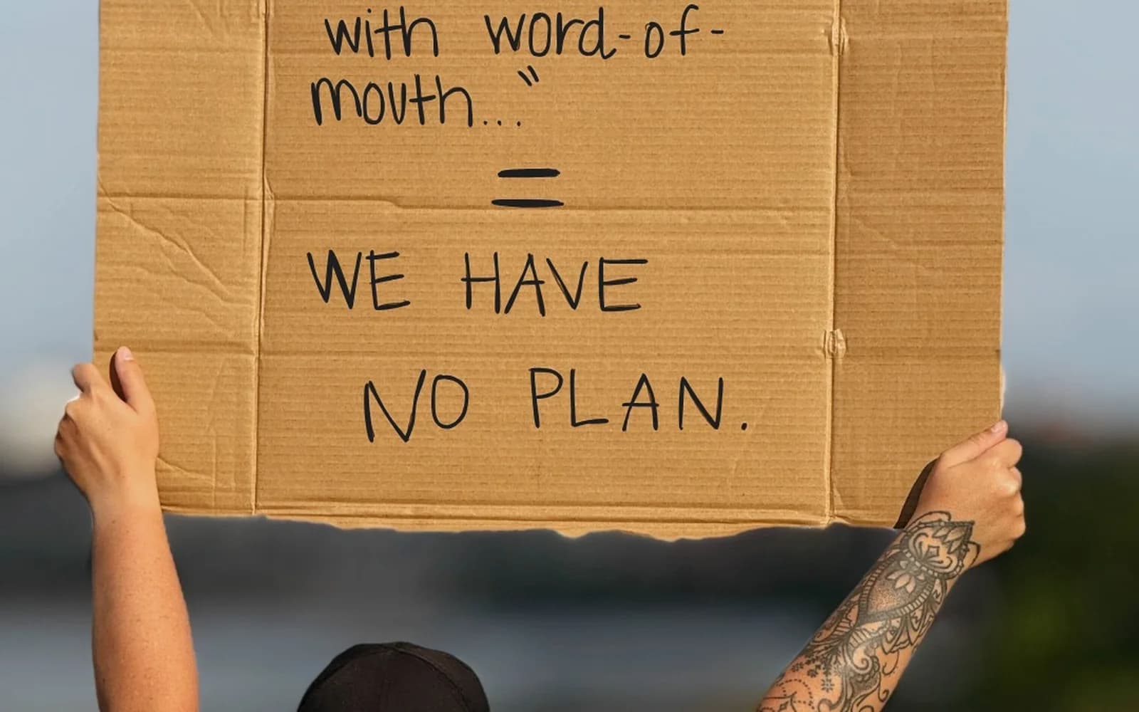 Contractor holding a sign about having no plan for an SEO foundation article
