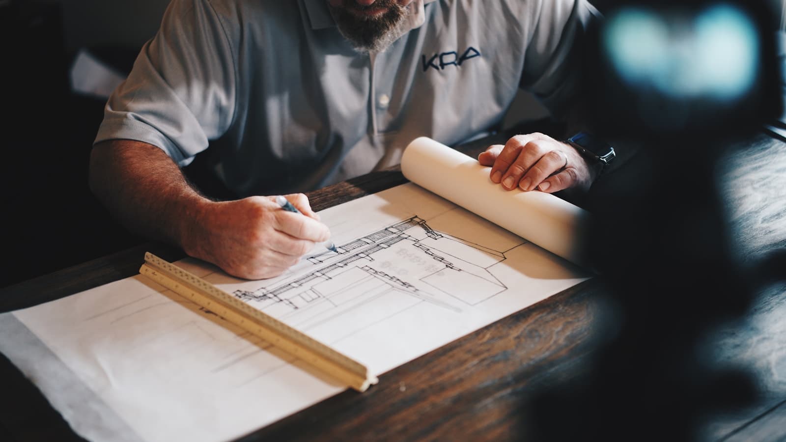 Architect drawing plans for a 2026 remodeler and home builder SEO framework