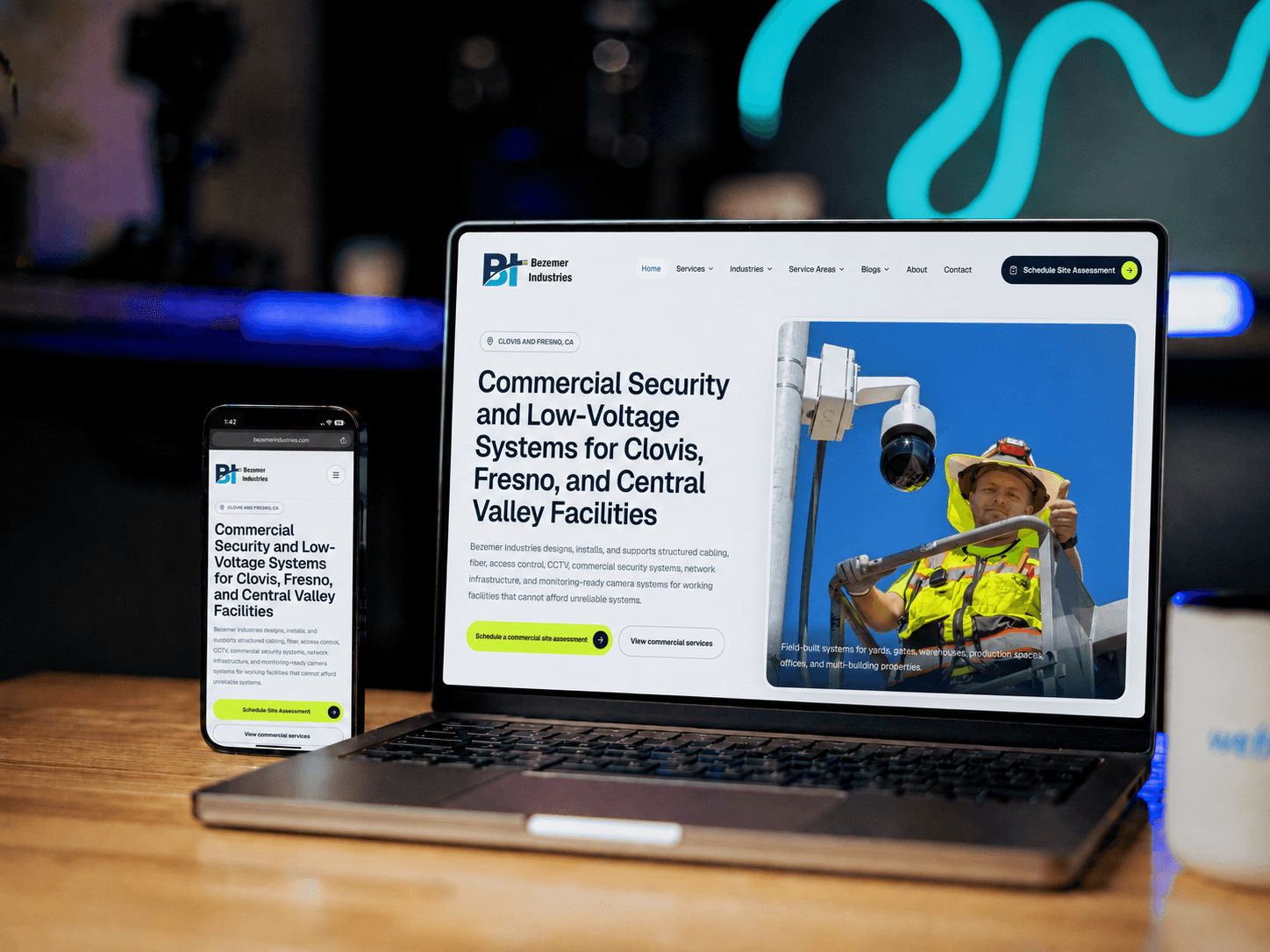 Bezemer Industries revised website mockup on a laptop and phone